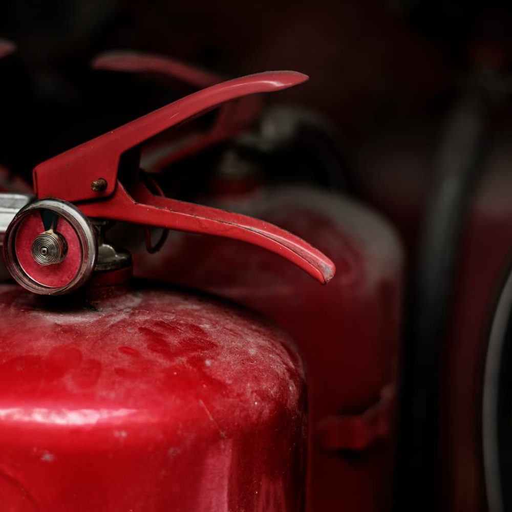 closeup-red-fire-extinguishers (1)